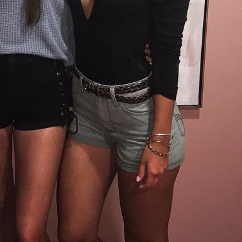 Green denim shorts